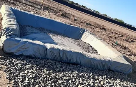 Stormwater BMP wrapped around a gravel area