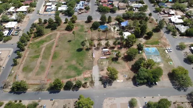Irrigation trenching through turf, aerial