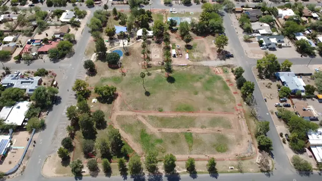 Irrigation trench layout across a park field, aerial