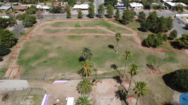 Trench routes across park turf