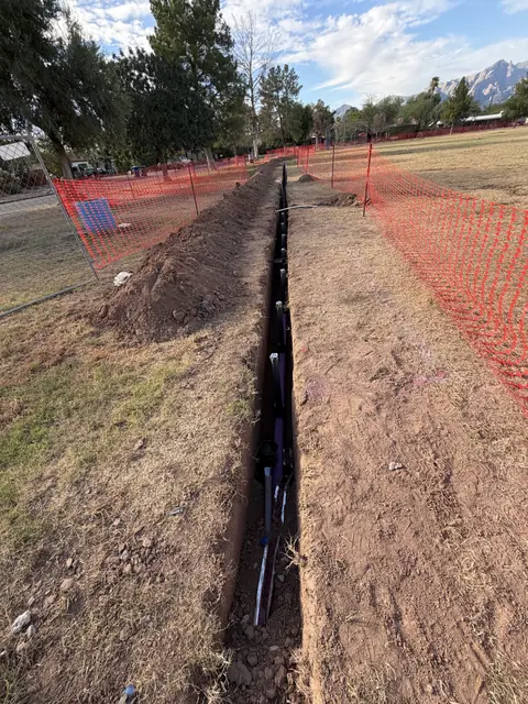 Irrigation mainline trench