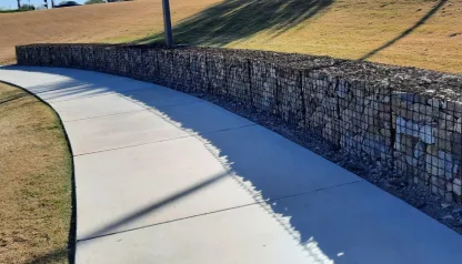 Gabion wall beside a path