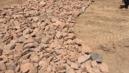 Rock placed for inlet and runoff protection