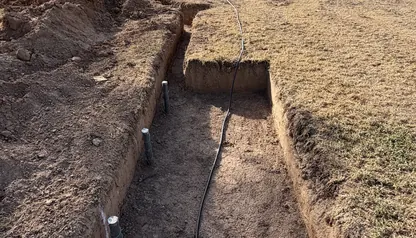 Irrigation trench junction with pipe and risers